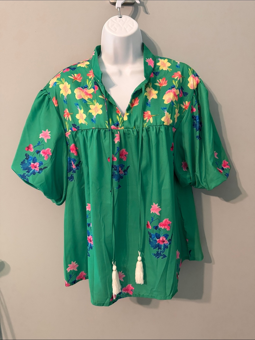 Green floral blouse.